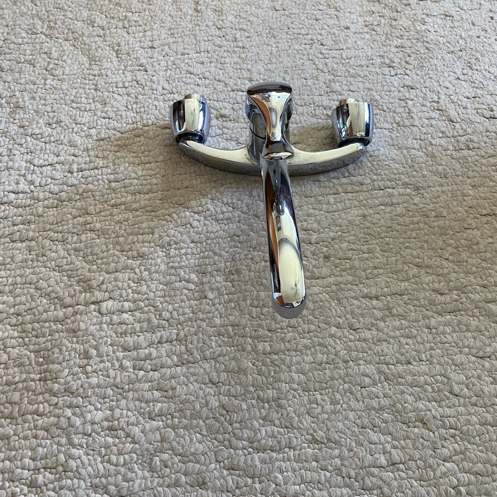 This is a delta wall mount faucet barely used,& works great